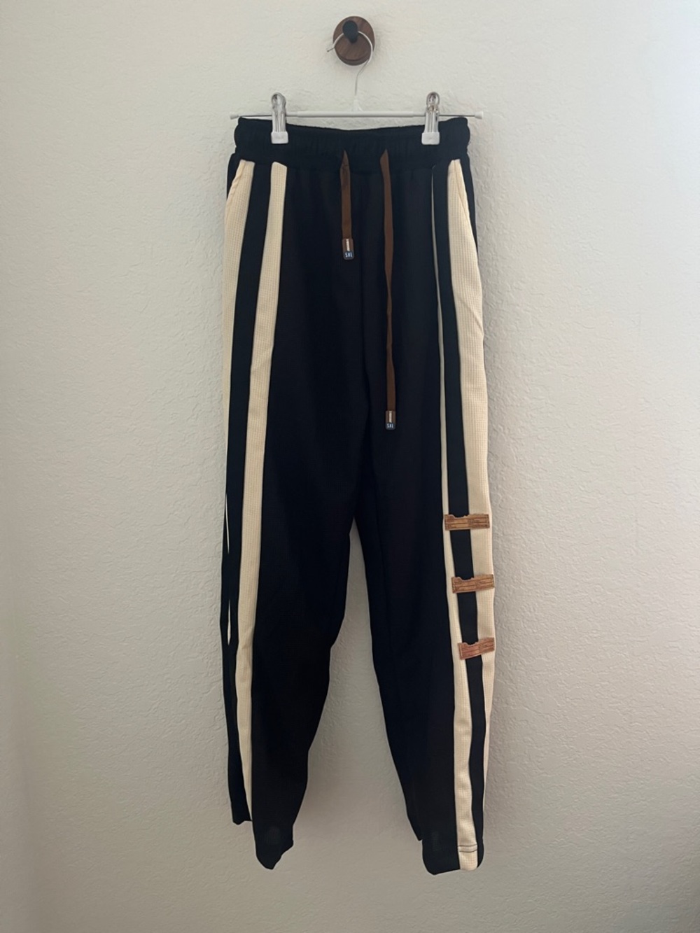Amazon Black Joggers with Cream Side Stripes and Brown Accents